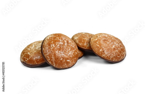 Glazed gingerbread lebkuchens with chocolate isolated on white. German round gingerbread called 'Lebkuchen' 