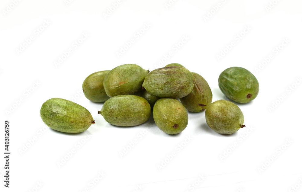 Mini kiwi baby fruit on white background. Kiwi berry isolated on white background. Mini kiwi baby fruit on white background. Kiwi berry isolated on white background.