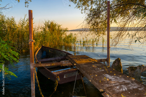 Old boat and reeds at Balatonfuzfo in Balaton photo