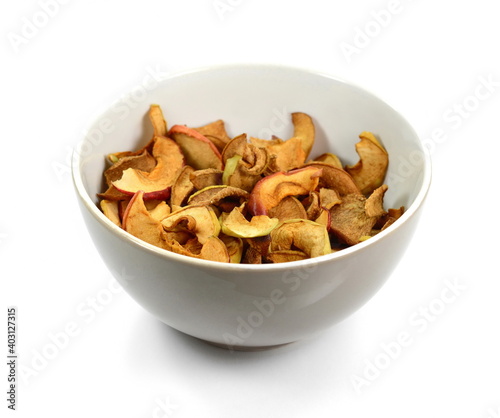 dried apple chips isolated on white background.