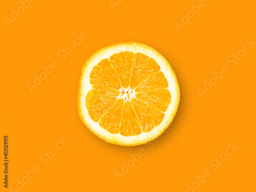 Orange fruit. Round orange slice isolate on orange background. Top view, flat lay.