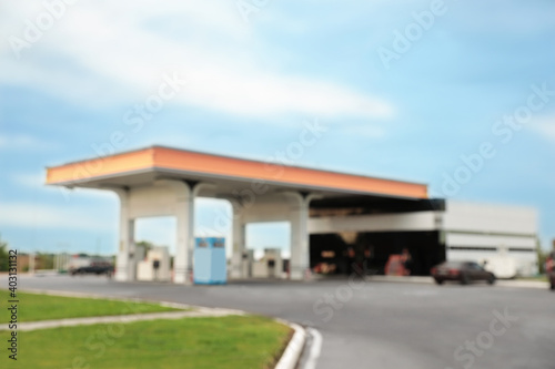 Blurred view of modern gas station outdoors © New Africa