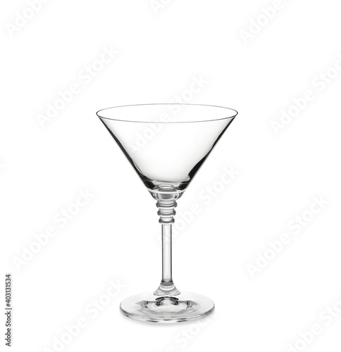 Empty clear martini glass isolated on white