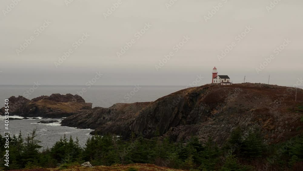 The beautiful Ferryland lighthouse with its bright red light tower. The beautiful Ferryland lighthouse with its bright red light tower.