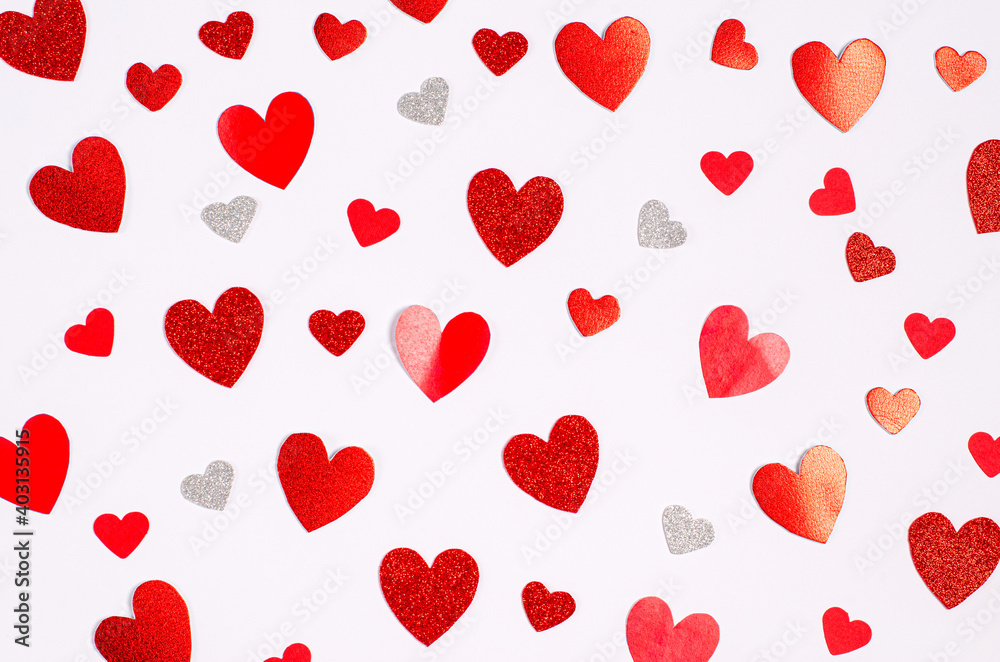 Pattern of red romantic hearts on a white background.