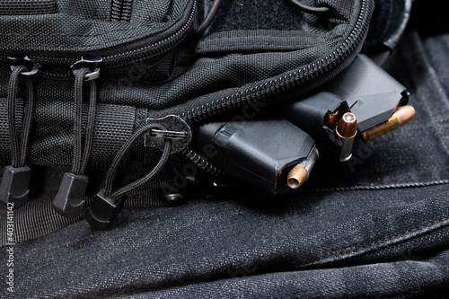 a tactical bag full of loaded magazines for a hand gun photo