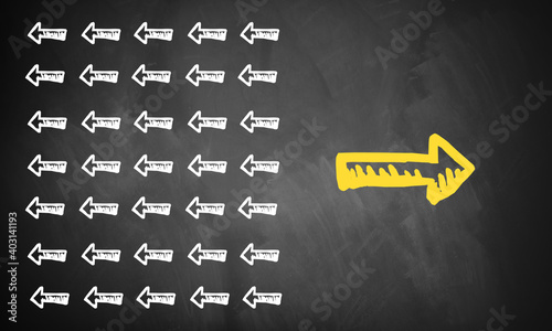 Photos chalkboard with an arrow symbol that points in different direction than all the
