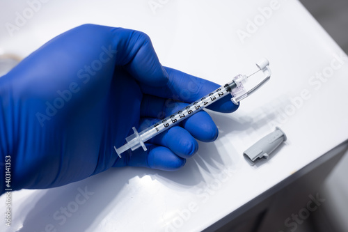 close up of an empty tuberculin syringe found on the sink photo