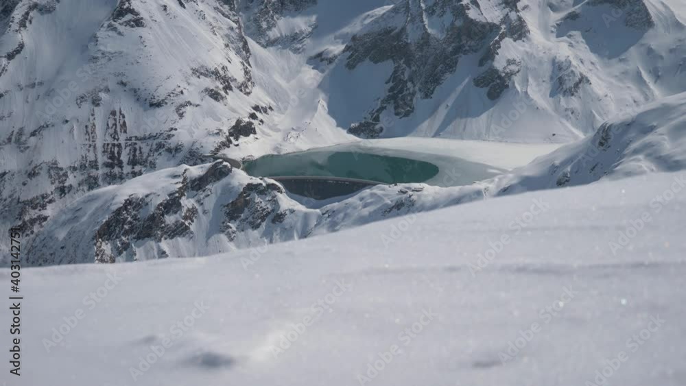 Water Reservoir In The Middle Of Austrian Alps Water Reservoir In The Middle Of Austrian Alps