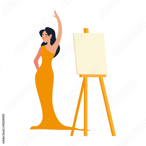 female model in elegant dress with canvas on easel