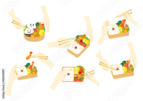 箸を使ってお弁当を作る手