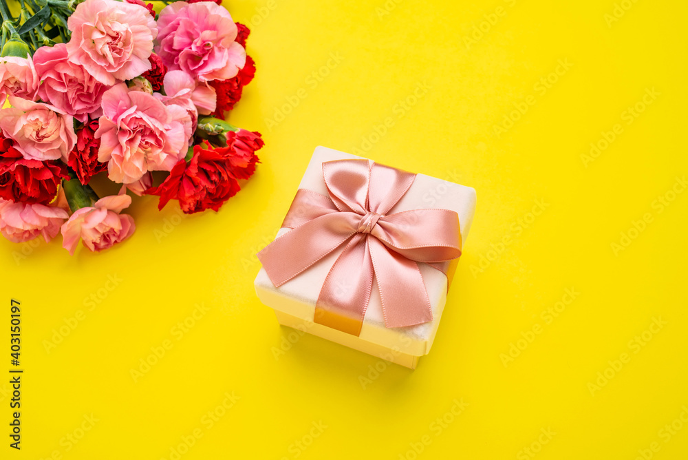 Exquisite gift box and carnation flowers Exquisite gift box and carnation flowers
