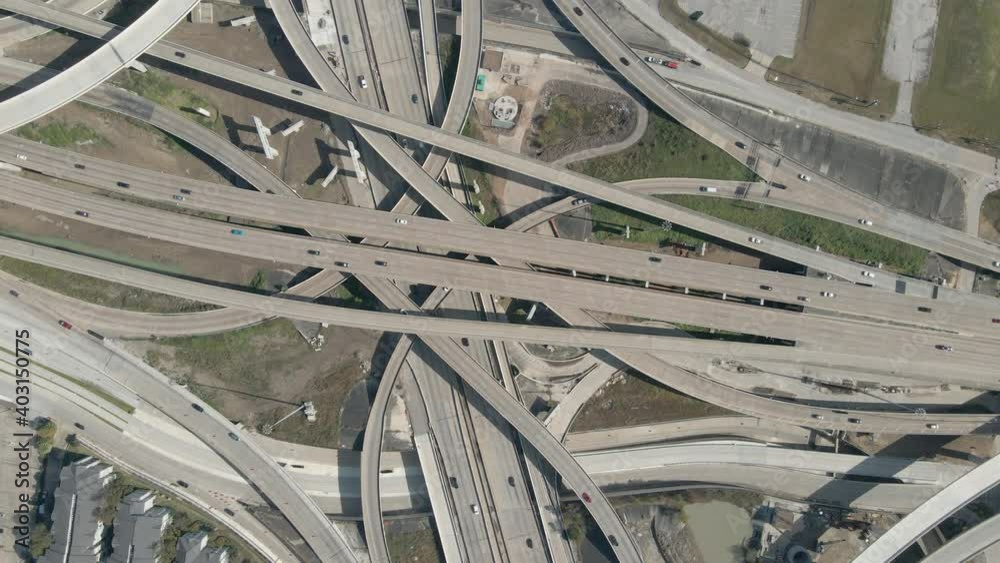 Top Down aerial view of the massive freeway interchange at I69 and I610 in Houston Texas. Birdseye Drone Shot of the biggest highway intersection Houston. Interstate 69 and Interstate 610 interchange. Top Down aerial view of the massive freeway interchange at I69 and I610 in Houston Texas. Birdseye Drone Shot of the biggest highway intersection Houston. Interstate 69 and Interstate 610 interchange.