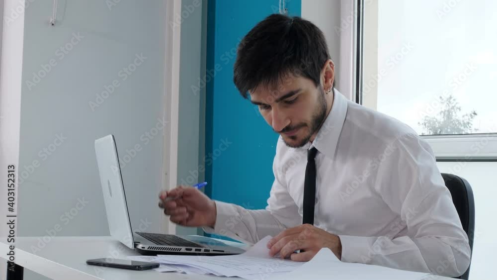 work, problems - stressed manager at computer throws the pen in a rage work, problems - stressed manager at computer throws the pen in a rage