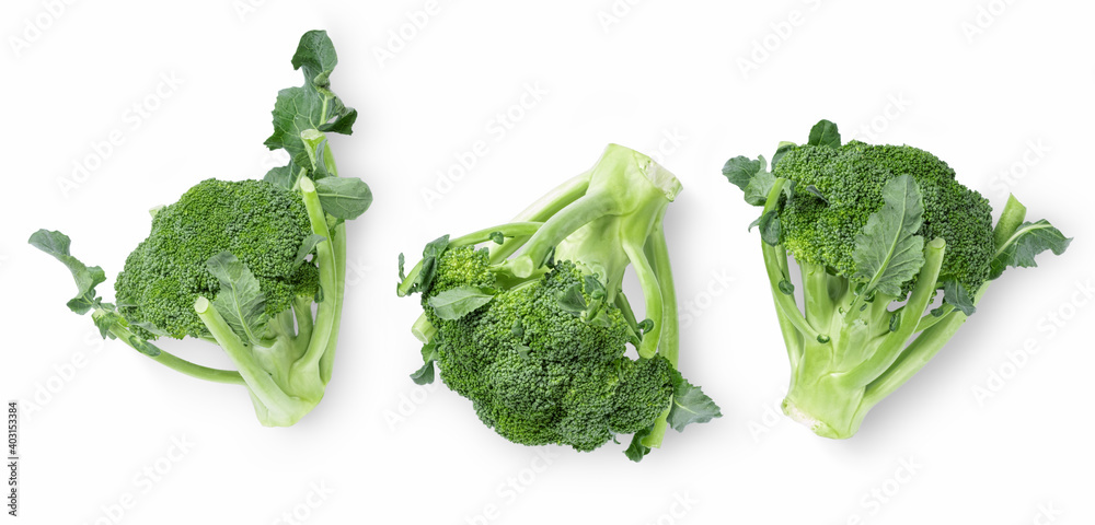 Three fresh broccoli on white background top view Three fresh broccoli on white background top view