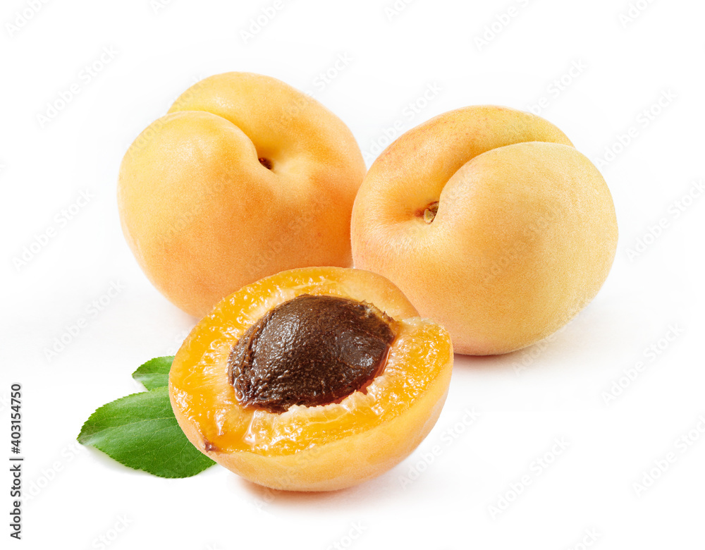 apricots group with slice and leaves isolated white background