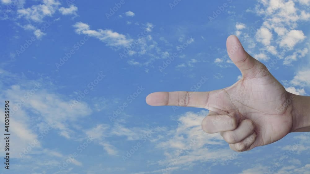 Security shield with check mark flat icon on finger over blue sky with white clouds, Technology internet cyber security and anti virus concept Security shield with check mark flat icon on finger over blue sky with white clouds, Technology internet cyber security and anti virus concept