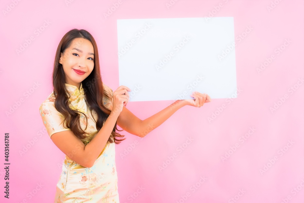 Portrait beautiful young asian woman with white empty billboard Portrait beautiful young asian woman with white empty billboard