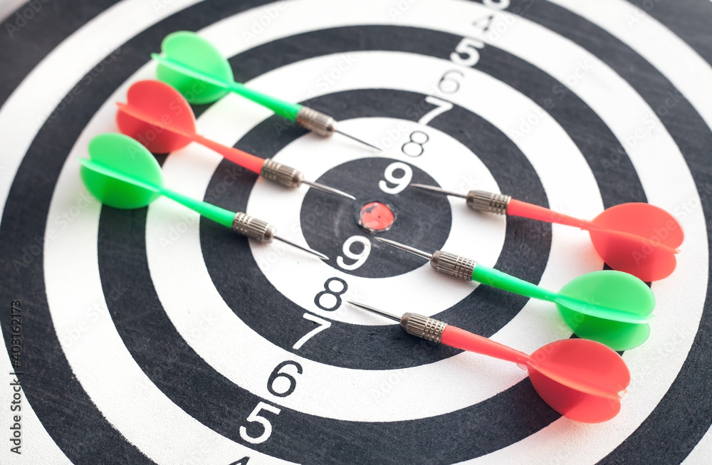 Dart arrows in the dartboard. Success Dart arrows in the dartboard. Success