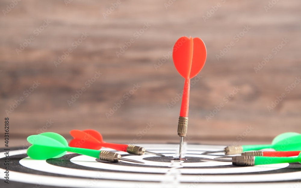 Dart arrows in the dartboard. Success Dart arrows in the dartboard. Success