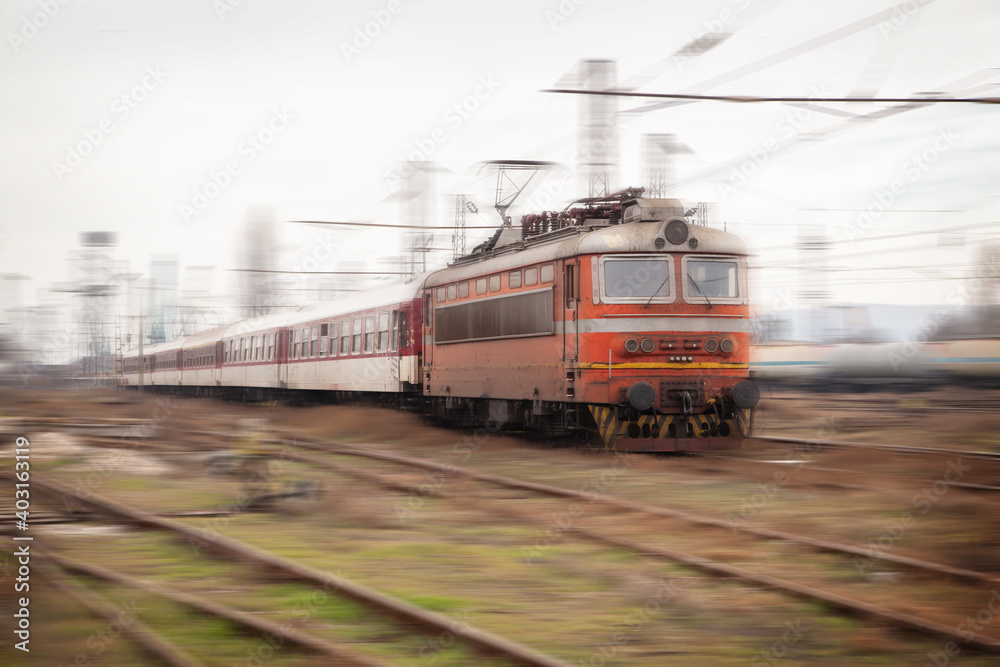 Old passenger train with motion blur effect. Railway transportation Old passenger train with motion blur effect. Railway transportation