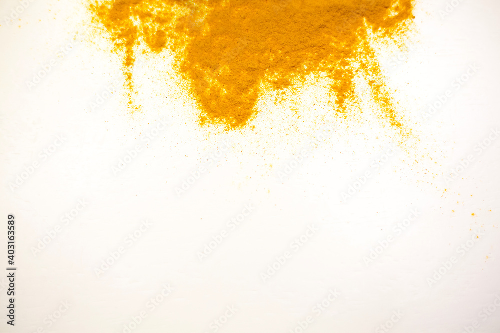 Turmeric powder, yellow color. White background Turmeric powder, yellow color. White background