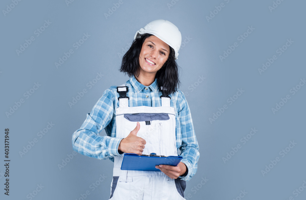 happy woman builder in protective helmet use document folder, construction happy woman builder in protective helmet use document folder, construction