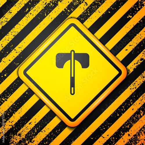 Black Medieval axe icon isolated on yellow background. Battle axe, executioner axe. Medieval weapon. Warning sign. Vector.