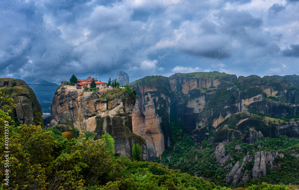 Cliff-top Eastern Orthodox monastery of Holy Trinity or Agia Triada in famous Meteora valley, Greece, UNESCO World Heritage. 