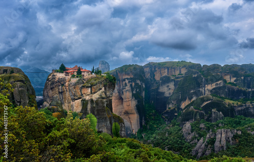 Cliff-top Eastern Orthodox monastery of Holy Trinity or Agia Triada in famous Meteora valley, Greece, UNESCO World Heritage. 