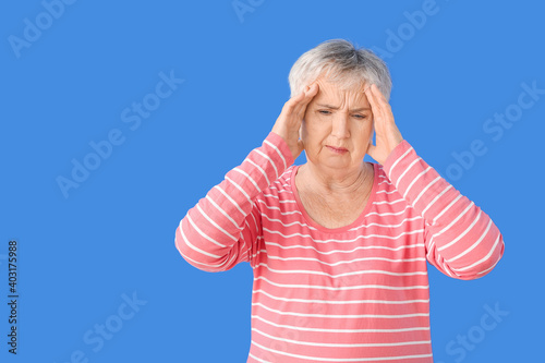 Stressed senior woman suffe...