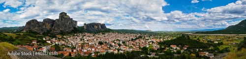 Panorama of Meteora valley and mountains at day in spring. Blue sky and great clouds, hills, Kalampaka and Kastraki. Greece, UNESCO World Heritage