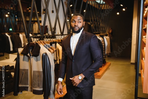 African American man in stylish new clothes on the street