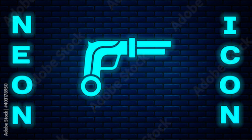 Glowing neon Vintage pistols icon isolated on brick wall background. Ancient weapon. Vector.