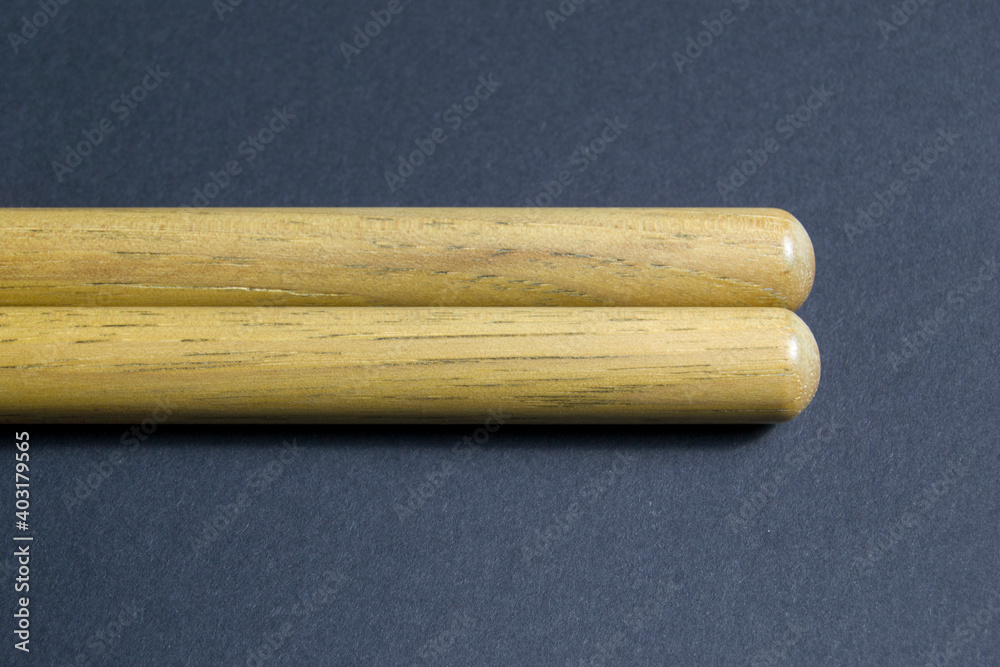 wooden drum sticks on black background wooden drum sticks on black background