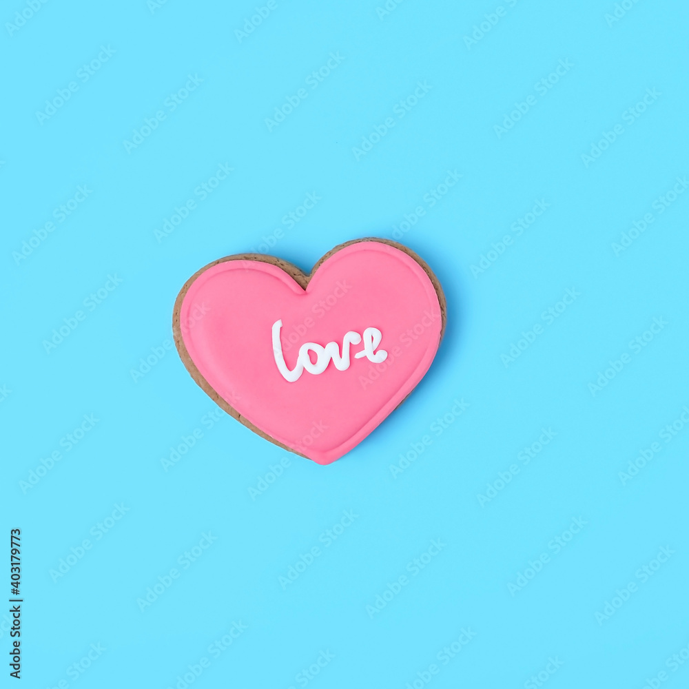 sweet cookies heart on blue background. symbol of love. Valentine's day, 14 february concept. romantic sweet gift