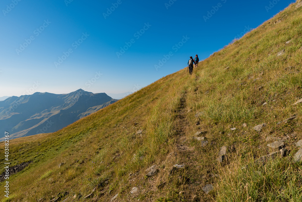 Two young women hiking on Grammos mountain