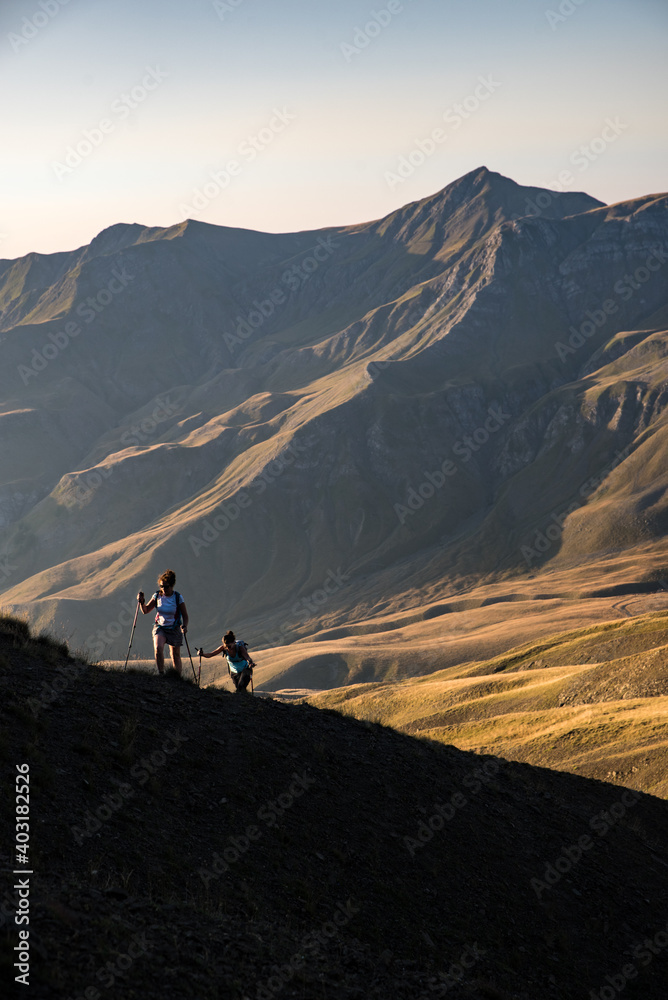 Two young women hiking on Grammos mountain