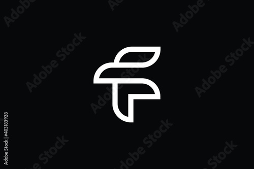 Free Download FT logo letter design on luxury background. TF logo monogram initials letter concept. FT icon logo design. TF elegant and Professional letter icon design on black background. F T TF FT - GFXLoad