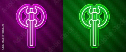 Glowing neon line Medieval axe icon isolated on purple and green background. Battle axe, executioner axe. Medieval weapon. Vector.