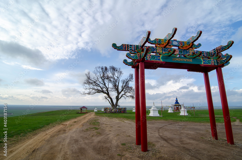 Fototapeta premium Pagoda and ritual drum and stupa with Buddhist symbols. Location Republic of Kalmykia