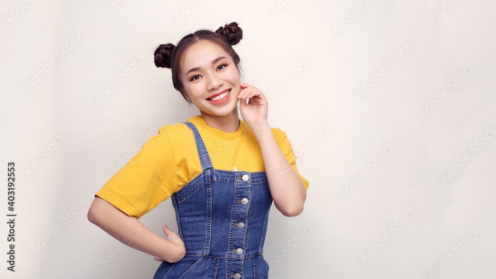 Naughty black-haired lady with bright makeup winks and smiles on white background Naughty black-haired lady with bright makeup winks and smiles on white background