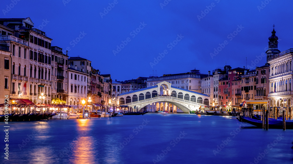 Venice Italy. Rialto Bridge in Venice Italy at dusk photographed from the grand canal