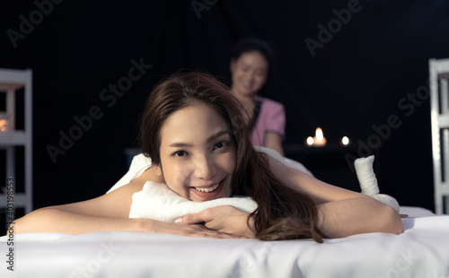 An Asian woman lounging in a spa. Massage and skin care make women more beautiful.