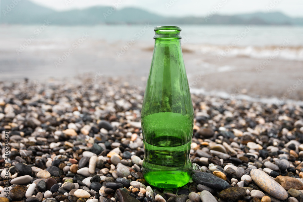 bottle of champagne on the beach bottle of champagne on the beach