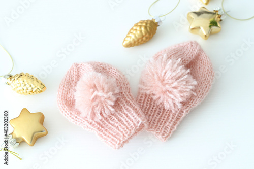 Fototapeta Naklejka Na Ścianę i Meble -  cute baby hand knitted wool mittens