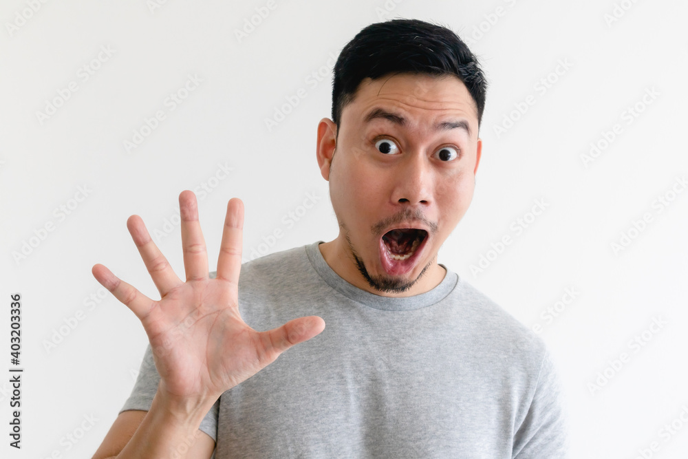 Surprised face Asian man making number hand sign on isolated white background. Surprised face Asian man making number hand sign on isolated white background.