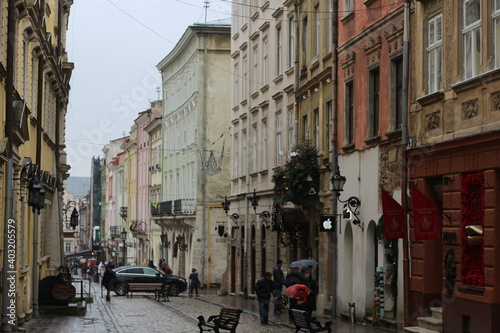 narrow Prague streets in the rain