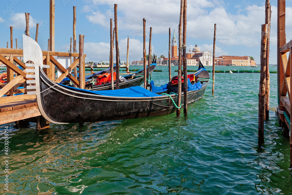Gondola on the background of the island of San Giorgio Maggiore in Venice (Italy)