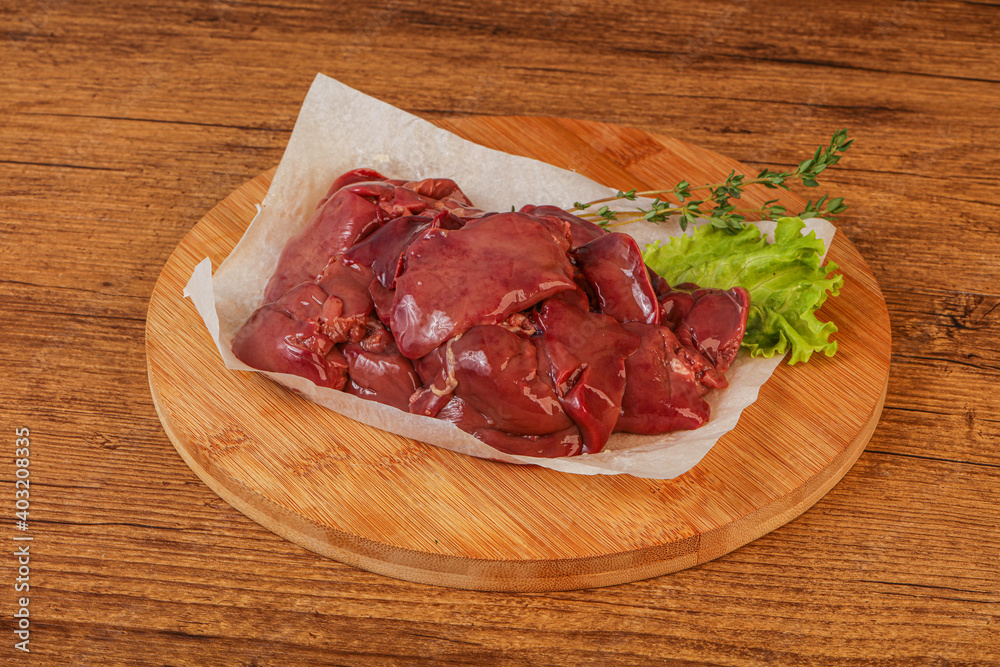 Raw chicken liver over board Raw chicken liver over board
